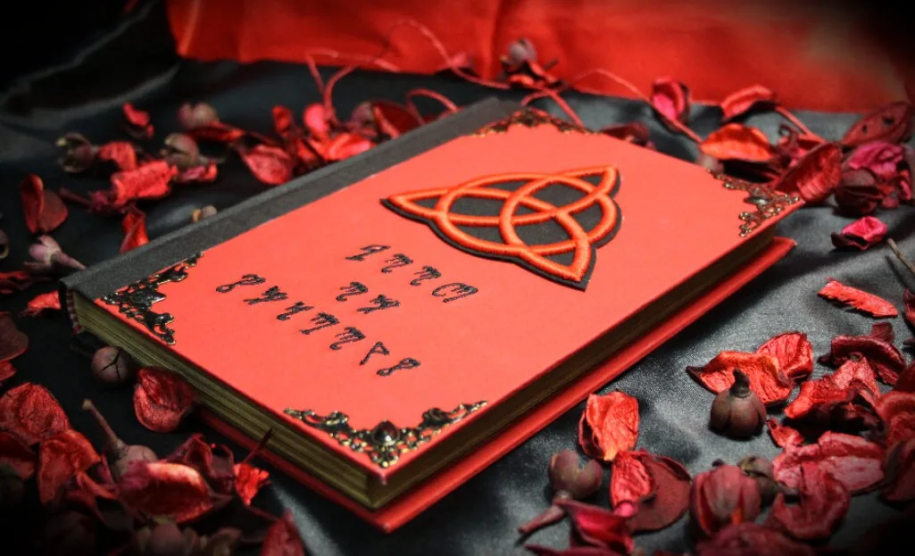 Red Theban Triquetra