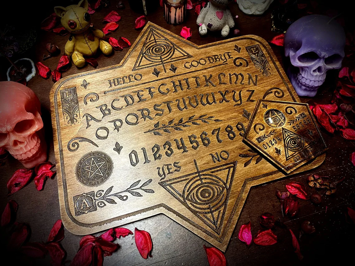 Handcrafted wooden Ouija board and planchette by The Little Sorcerer